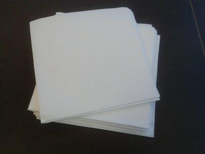 CARRÉ D'ESSUYAGE AIRLAID GAUFRÉ 50G 30X30CM BLANC X1500